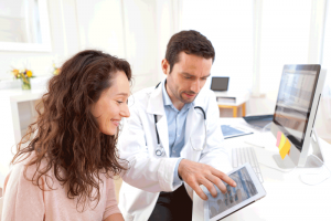 Doctor-patient-reviewing-electronic health records